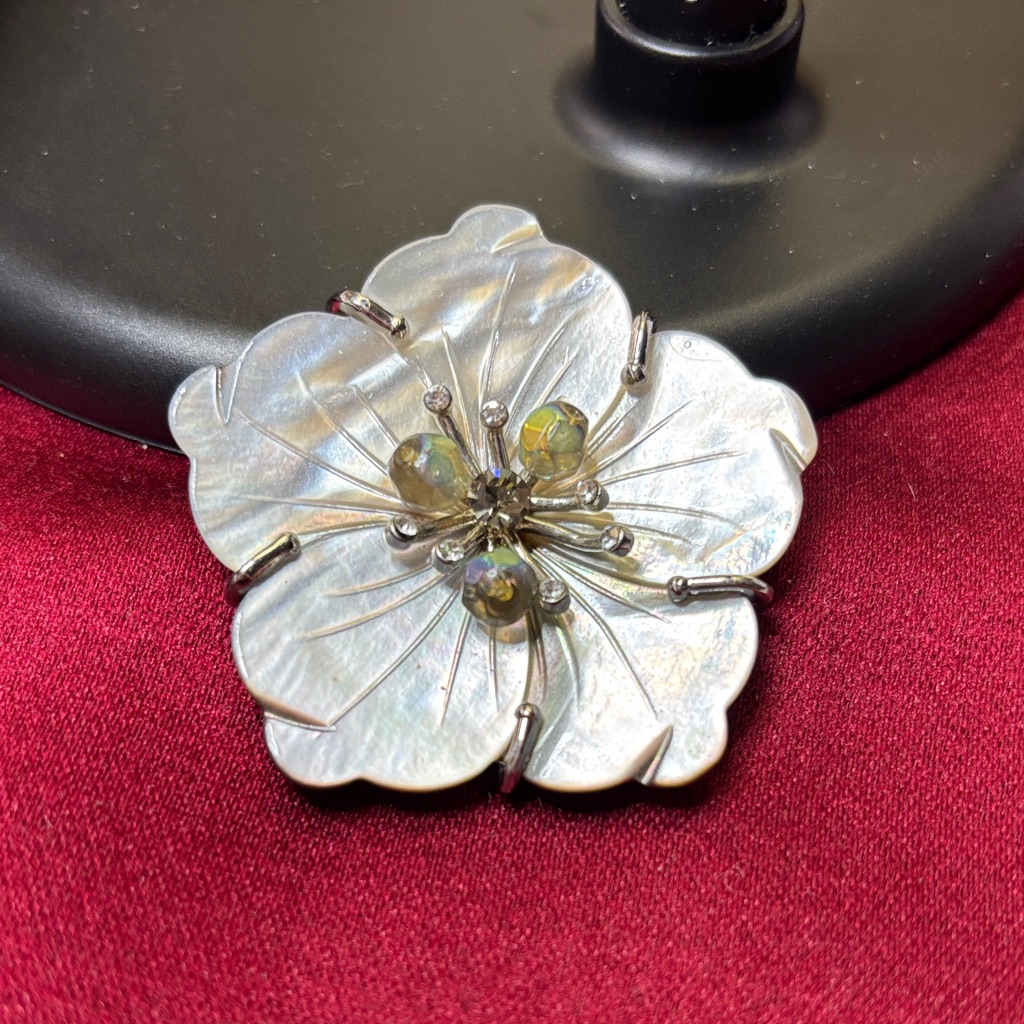 Silver Flower Brooch With Iridescent Bead Center